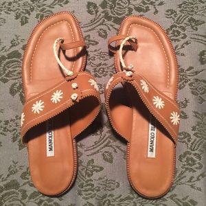 Manolo Blahnik toe ring flat sandals.